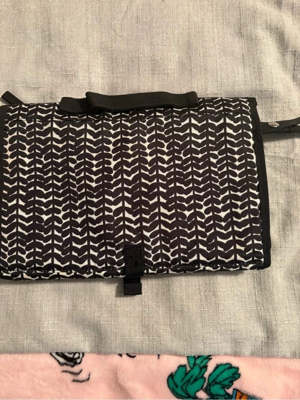 Skidaddle by Skip Hop Black & White Travel diaper bag with fold out changing pad